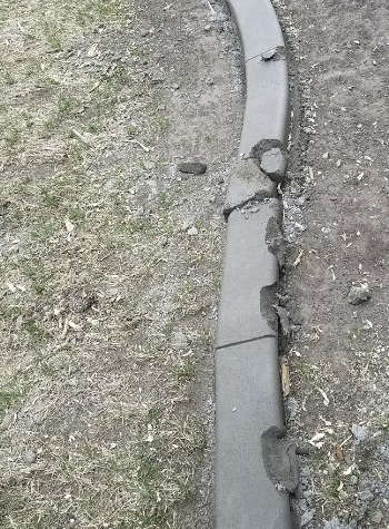 Curb Maintenance Damaged 2